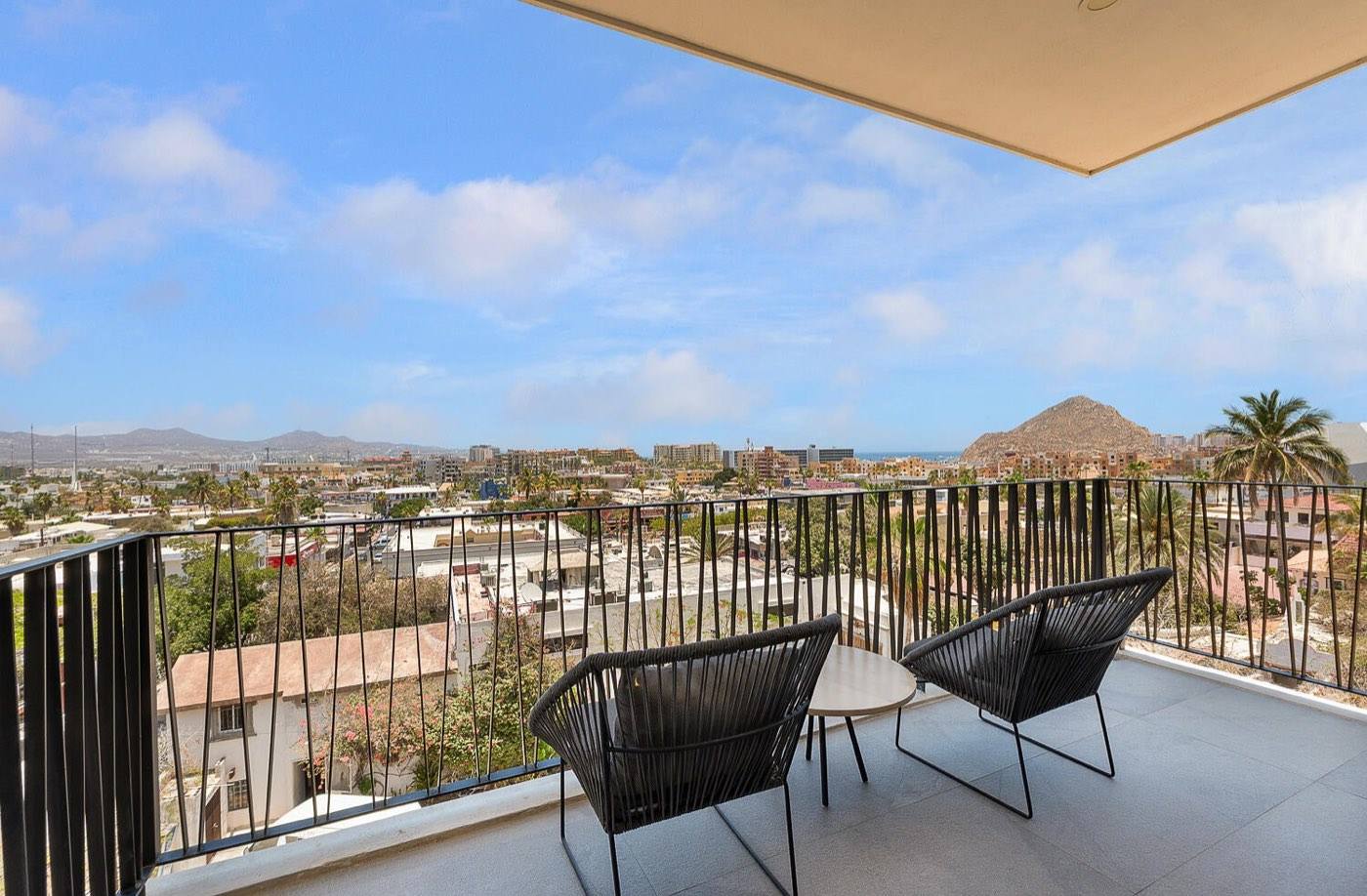 Suite balcony looking toward Cabo San Lucas marina and Pedregal mountains